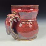 Handmade Stoneware Coffee Mug: Red Glaze, Slip Trail Dotted Pottery Tea Mug - item 3668