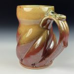 Handmade Stoneware Coffee Mug: Iron Red with White Ash Glaze, Twisted - item 3770 - Image 2