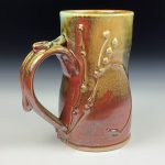 Handmade Stoneware Coffee Mug: Iron Red with White Ash Glaze, Twisted, Bamboo Slip Bump - item 3768