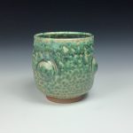 Artisan Ceramic Handmade Stoneware Pottery Tea Cup: Green Ash Bump - item 1078