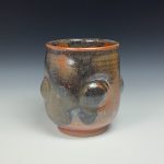 Artisan Ceramic Handmade Stoneware Pottery Tea Cup: Orange Ash Bump - item 1074
